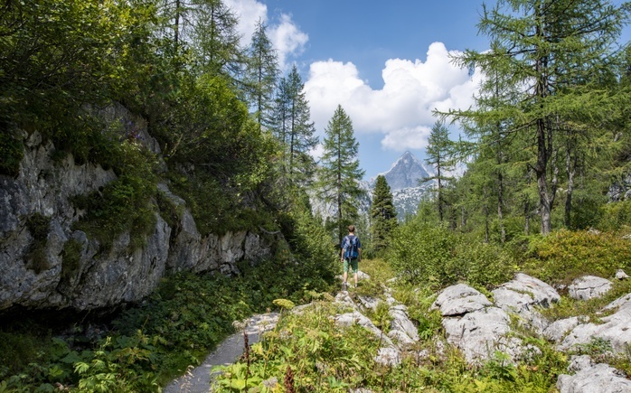 Germany Hiking Hiker on hiking trail to K rlingerhaus, behind Watzmann, K nigssee, National Park Berchtesgaden, Berchtesgadener Land, Upper Bavaria, Bavaria, Germany, Europe, Photo by Mara Brandl