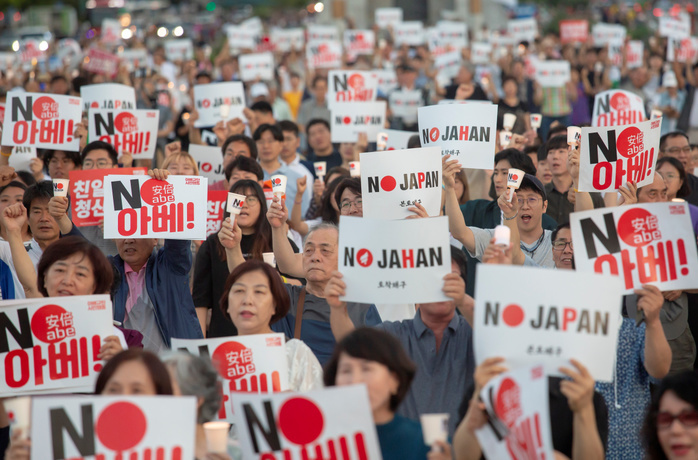 Rally to denounce Japanese Prime Minister Shinzo Abe and his regime in Seoul Anti Japanese government rally, August 24, 2019 : People attend a rally to denounce Japanese Prime Minister Shinzo Abe and his regime in Seoul, South Korea. Hundreds of people attended the rally. Signs read, No Abe    L and far R  and  No Liberty Korea Party : Japanese Pirate Raiders who are from Japan and domiciliated in Korea . Jahan stands for South Korea s main opposition Liberty Korea Party  LKP .  Photo by Lee Jae Won AFLO   SOUTH KOREA 
