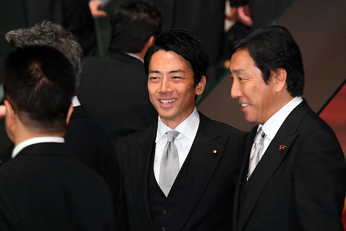 Environment Minister Shinjiro Koizumi  center  and Economy, Trade and Industry Minister Kazuhide Sugawara smile after a commemorative photo after their first cabinet meeting. Environment Minister Shinjiro Koizumi  center  and Economy, Trade and Industry Minister Kazuhide Sugawara smile after a commemorative photo after their first cabinet meeting at the Prime Minister s Office on September 11, 2019  photo by Natsuho Kitayama .
