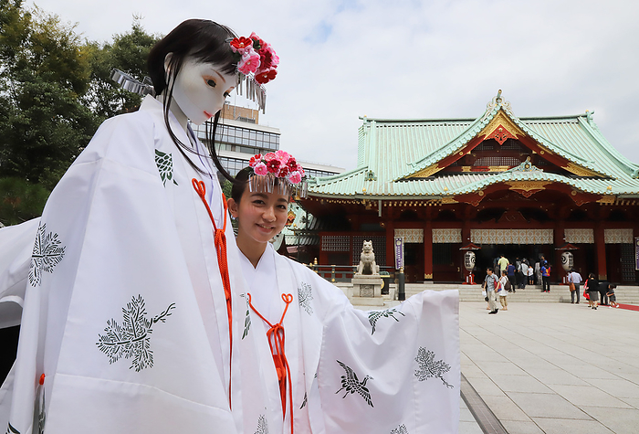 A humanoid robot Cocona Kosaka performs with a model Anju Ohata at the Kanda shrine September 14, 2019, Tokyo, Japan   A Japanese model Anju Ohata  R  smiles with a humanoid robot Cocona Kosaka  L  in costumes before they perform a Shinto maiden dance at the ground of the Kanda shrine in Tokyo on Saturday, September 14, 2019. The life sized entertainment robot in height of 155cm, developed by Japanese robot venture Speecys, performs 3 times in a day at Tokyo s oldest shrine.     Photo by Yoshio Tsunoda AFLO 