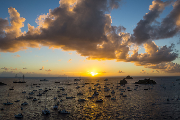 Caribbean, Lesser Antilles, Saint Barthelemy, Sunset over the luxury yachts, in the harbour of Gustavia