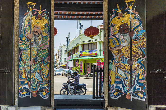 Ornate doors at Han Jiang Ancestral Temple in George Town, a UNESCO World site, Penang Island, Malaysia, Southeast Asia, Asia. Ornate doors at Han Jiang Ancestral Temple in George Town, UNESCO World Heritage Site, Penang Island, Malaysia, Southeast Asia, Asia, Photo by Chris Mouyiaris