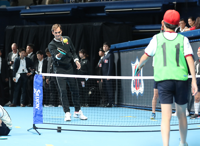 Uniqlo holds a charity tennis event Uniqlo LifeWear day Tokyo October 14, 2019, Tokyo, Japan   Swiss tennis player Roger Federer  L  enjoys tennis with a mitten as he joins a tennis clinic for children as Uniqlo holds a charity tennis event  Uniqlo Lifewear day Tokyo  in Tokyo on Monday, October 14, 2019.    Photo by Yoshio Tsunoda AFLO 