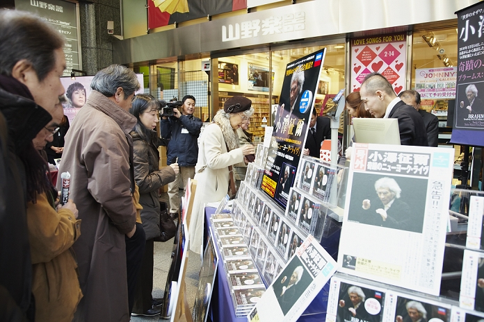 Seiji Ozawa's CD release, Jan 26, 2011: Japanese conductor Seiji Ozawa, who just recovered from cancer, has made a comeback with a new CD release Crowds gathered in front of a CD shop in Ginza, Tokyo, Japan. Tanaka/AFLO) [1120].