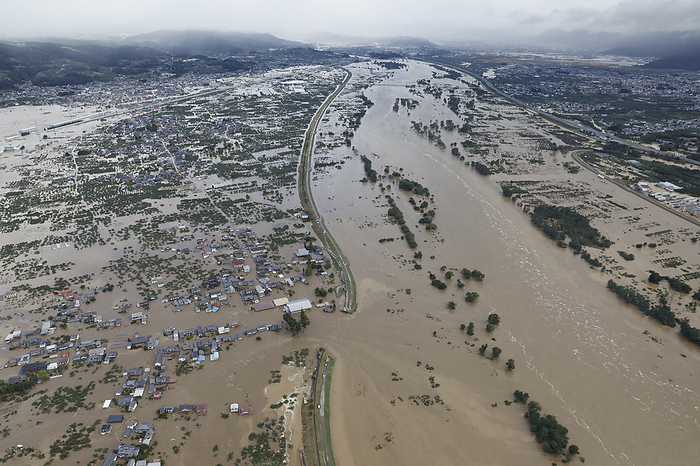 Typhoon No. 19 damages eastern Japan  Nagano, Nagano Pref. The Chikuma River burst its banks in Hobo, Nagano City, in 2019 after heavy rains caused by Typhoon No. 19 swelled the river and caused it to overflow. From the head office helicopter at 8:15 a.m. on October 13.