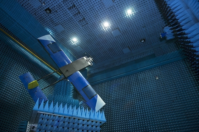 Drone antenna testing This image may not be used to state or imply ESA endorsement of any company or product   Drone antenna testing. Unmanned aircraft being tested in the European Space Agency s  ESA  Hertz radio frequency anechoic test chamber. The drone, developed by Barnard Microsystems Ltd of the UK, has a steerable array antenna in its wing to keep contact with satellites. Designed for oil, gas and mineral prospecting, pipeline surveying and border patrols, the drone will spend most of its time operating far from its controller, often in areas with no communications infrastructure. ESA s ESTARR project   Electronically Steered Antenna Array in the Wing of a Remotely Piloted Aircraft   is investigating the feasibility of such systems. Photographed in 2017.