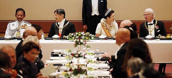 Accession Ceremony Feast Their Majesties the Emperor and Empress of Japan welcome King Bolkiah of Brunei  left  and King Carl XVI Gustaf of Sweden  right  at the Feast Ceremony at the Imperial Palace, Toyomeiden, October 22, 2019, 9:02 p.m.  Representative photo 