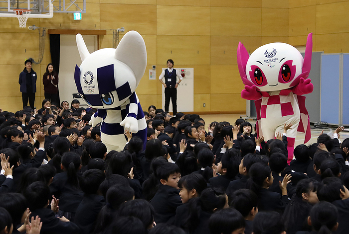 Tokyo 2020 Olympics mascot Miraitowa robot and Paralympics mascot Someity robot demonstrate at a school November 18, 2019, Tokyo, Japan   Tokyo 2020 Olympics mascot Miraitowa robot  L  and Paralympics mascot Someity robot  R  are greeted by elementary school children as their robots demonstrate before pupils at the Hoyonomori Gakuen school in Tokyo on Monday, November 18, 2019. The robots developed by Toyota Motor are part of Tokyo 2020 robot project.     Photo by Yoshio Tsunoda AFLO 