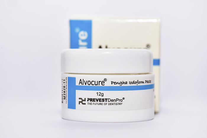 Alvocure dry socket dental treatment Alvocure dry socket dental treatment. This paste like preparation has a fibrous consistency that makes it easy to apply to a tooth socket following a tooth extraction or following the development of a  dry socket   alveolar osteitis . The latter condition is where the bone underlying the extracted tooth becomes inflamed. Alvocure has antimicrobial action due to the presence of iodoform  carbon triiodide . The other active agents are eugenol  an analgesic  and butamben  an anaesthetic .