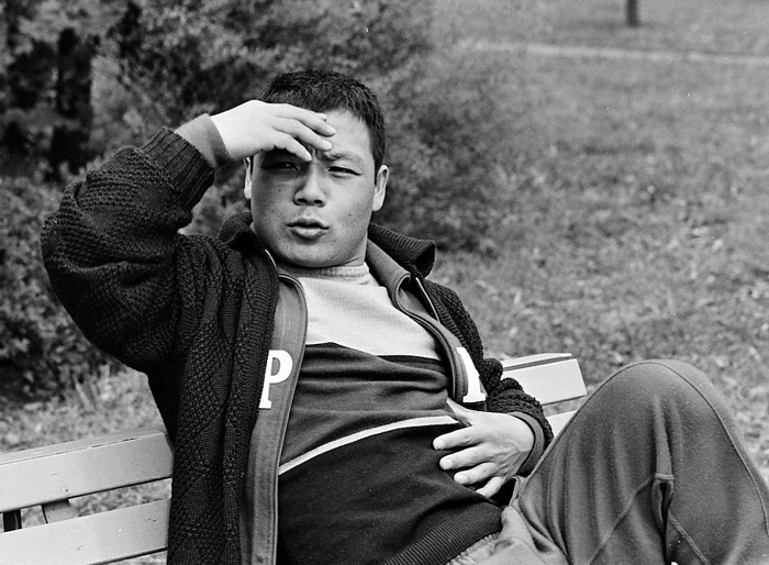 1964 Tokyo Olympics On the morning of the match, Yoshinobu Miyake, a featherweight weightlifter, sits on a bench in the athletes  village with a relaxed expression on his face. In his Tohoku dialect, he rubs his stomach, saying,  I ate a lot of natto  fermented soybeans  this morning, my favorite food, for the first time in a long time. Miyake won the gold medal in the afternoon match at the athletes  village in Yoyogi, Shibuya Ward, Tokyo, on October 12, 1964.