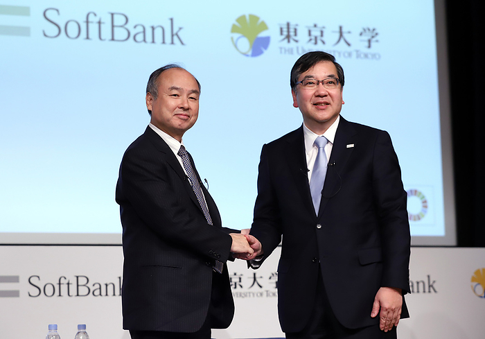 Softbank and University of Tokyo announce to establish Beyong AI Institute December 6, 2019, Tokyo, Japan   Japan s IT company Softbank Group president Masayoshi Son  L  shakes hands with University of Tokyo president Makoto Gonokami  R  as they announce to establish the  Beyong AI Institute  which will conduct fundamental research for  artificial intelligence  AI  technology and for incorporating research from other academic fields at the University of Tokyo on Friday, December 6, 2019. Softbank is expecting to invest 20 billion yen for 10 years for this project.     Photo by Yoshio Tsunoda AFLO 