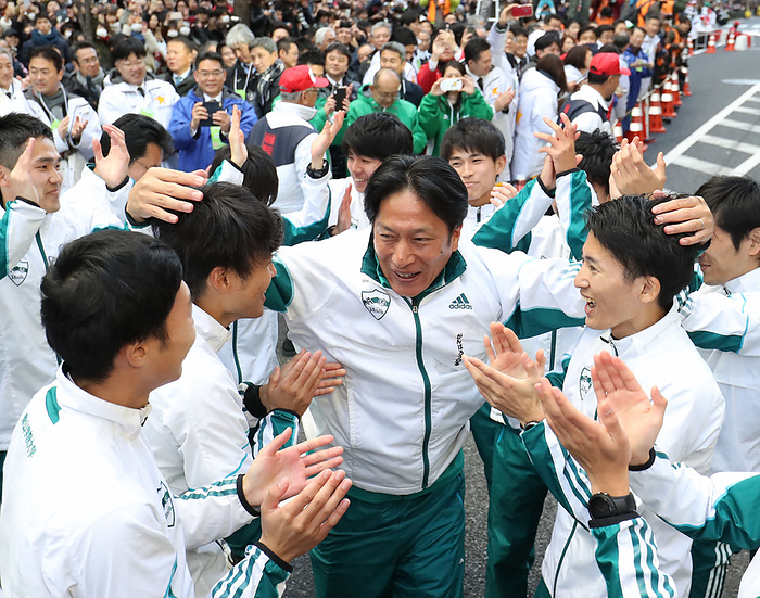 Aoyama Gakuin wins the 96th HAKONE EKIDEN, return leg. Susumu Hara, coach of Aogaku University, congratulates his athletes after winning the overall championship in the Hakone Ekiden, January 3, 2020, 1:25 p.m. in Chiyoda ku, Tokyo  representative photo .