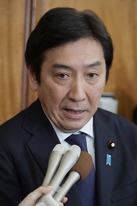 The 201st Ordinary Session of the Diet convenes. Former Minister of Economy, Trade, and Industry Kazuhide Sugawara answers reporters on the opening day of the ordinary session of the Diet about allegations against him, etc., in the Diet on January 20, 2020.