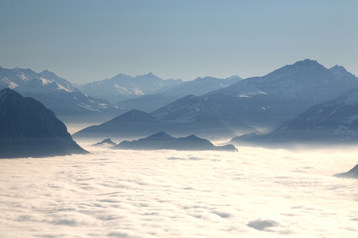 View onto the sea of fog in the Rhine river valley, East Swiss Mountains from the Hoher Kasten mountain, Appenzell Innerrhoden canton, Switzerland