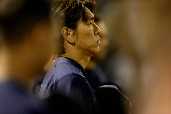 Hideki Matsui  Yankees  March 24, 2003 : Hideki Matsui of the New York Yankees applies a hand to a breast and listens to the  God Bless America  during a spring  C Thomas Anderson AFLO FOTO AGENCY  903   JAPANESE NEWSPAPER OUT 
