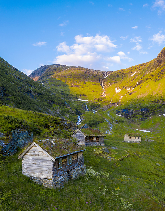 Aerial panoramic of Dalsnibba mountain and traditional wood huts, Stranda municipality, More og Romsdal county, Norway Aerial panoramic of Dalsnibba mountain and traditional wood huts, Stranda municipality, More og Romsdal county, Norway, Scandinavia, Europe, Photo by Roberto Moiola
