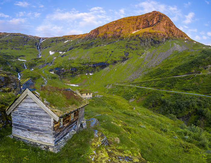 Aerial panorama of Dalsnibba mountain and traditional huts with grass roof, Stranda municipality, More og Romsdal county, Norway Aerial panorama of Dalsnibba mountain and traditional huts with grass roof, Stranda municipality, More og Romsdal county, Norway, Scandinavia, Europe, Photo by Roberto Moiola
