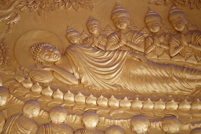 Reclining Buddha. After 45 years of teaching the Dharma, the Buddha passed into Parinirvana. Ba Ria. Vietnam. 