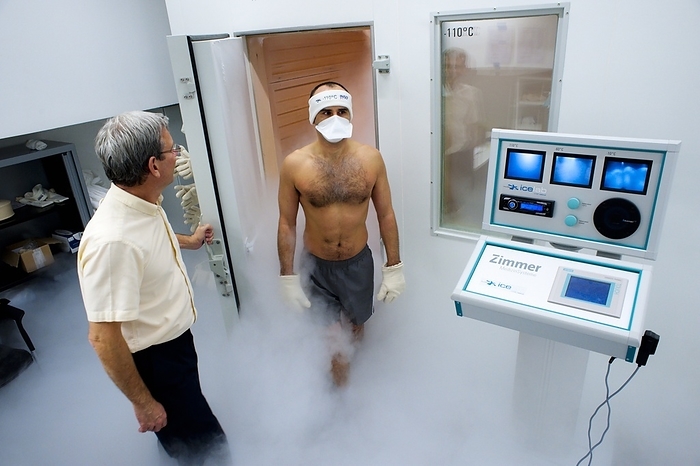 Cryotherapy research Cryotherapy research. Athlete exiting a cryotherapy chamber during research to determine the therapeutic effects of the cold on an athlete s recovery after exercise. After a strenuous physical fitness test the athlete spends time in a cryotherapy chamber. Cryotherapy is a medical therapy technique that uses low temperatures. It is most commonly used to decrease cellular metabolism, inflammation, pain and spasm, in order to promote healing. Cryogenic chamber therapy  seen here  is a form of whole body cryotherapy that places the patient in a specially designed chamber for a short period. Photographed at the INSEP  Institut National du Sport et de l Education Physique , Paris, France.