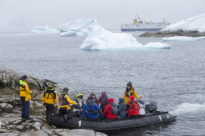 Antarctic tourism Editorial use only   Passengers from an Antarctic cruise ship land in Zodiacs on Portal Point, Antarctic Peninsular.