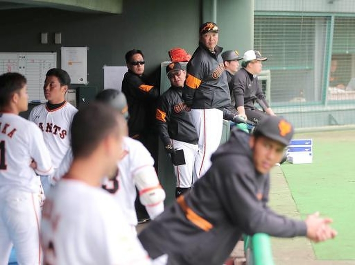 2020 Professional Baseball Farm Practice Game Farm practice game. Shinnosuke Abe, manager of the second team, and a second team player prepare on the bench during a game at the Giants  Doosan  South Korea . Photo taken February 26, 2020 at San Marin Stadium. 