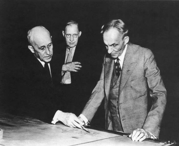 Dearborn, Michigan: 1937
L-R: Orville Wright, Charles Taylor and Henry Ford look over the blueprint of Wrights 1903 engine at Greenfield Village.