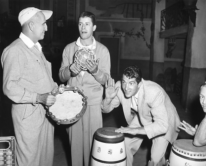 Hollywood, California:  1953
Director George Marshall gives instructions to Jerry Lewis and Dean Martin on how to rattle a golfing opponent during the filmiing of the movie 