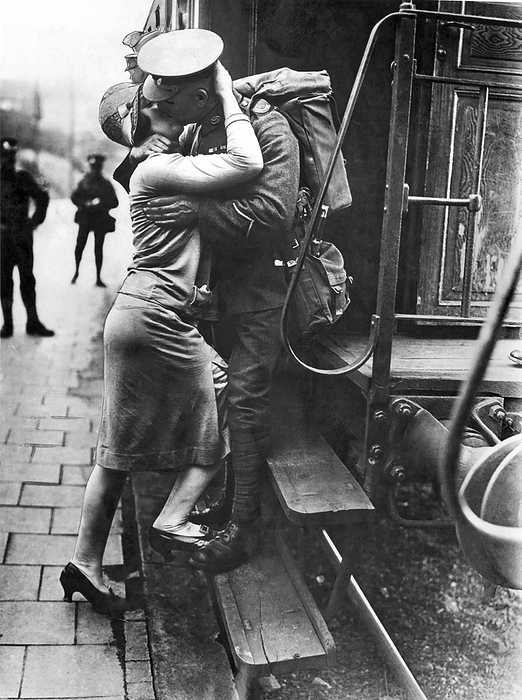 Konigstein, Germany:  September 23, 1929.
A British Tommie bestows a last kiss upon his Rhineland sweetheart as his detachment leaves for England as they evacuate Germany.