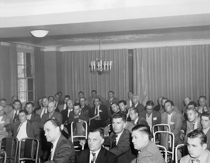 California:  c. 1953
Thirty-nine incredibly bored looking men sitting in a small conference room.