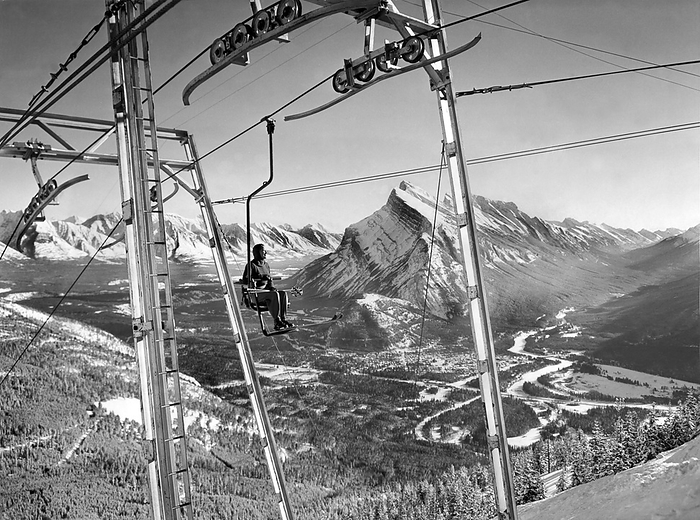 Banff, Alberta, Canada:  c. 1949
Amazing panorama showing Mt. Rundle and the Bow and Spray Valleys from high in the sky above Banff National Park in Alberta.