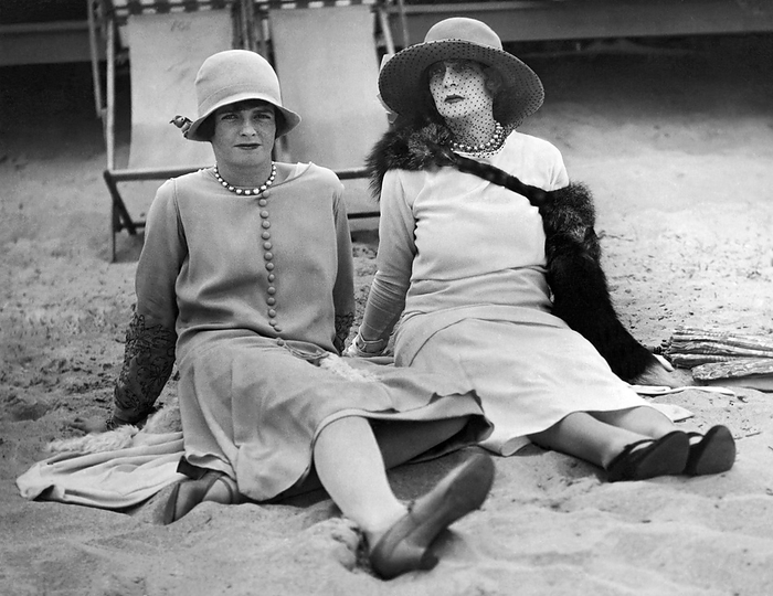 Palm Beach, Florida:   January 31, 1926.
A New York society matron and her daughter  practice relaxing on a Florida beach.