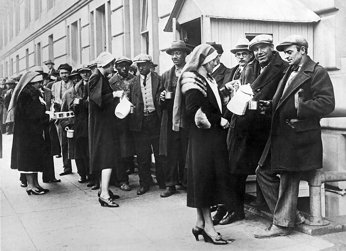 Washington, D.C.: February 27, 1931.
WWI veterans waited all night in line in front of the Veterans Bureau to file applications for loans under the new Bonus Law. Red Cross workers are serving them coffee.