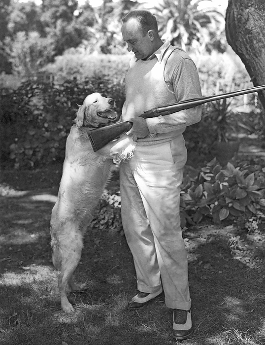 Atherton, California:  July 11, 1936
Baseball star Ty Cobb relaxes with his dog after hunting.