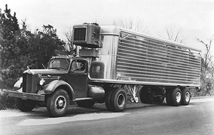 United States:  c. 1947
A Mack truck hauling a refrigerated semi trailer.