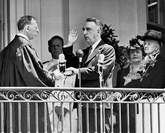 Washington, D.C.:  October 7, 1946.
Fred Vinson, takes his oath as the new Chief Justice of the Supreme Court in a ceremony on the south portico of the White House.