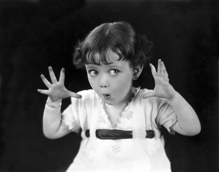 Hollywood, California:  November 23, 1922.
Priscilla Moran, who had a brief career in films as a child actor, gives her scary look at age 4.