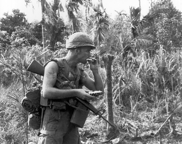 Boi Lo Woods, Vietnam:  May, 1966
 A 25th Infantry Division soldier takes a refreshing bite out of a freshly picked pineapple while on a search and destroy mission during Operation Wahiawa.