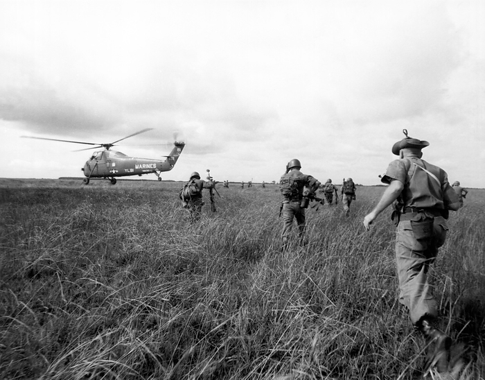 Vietnam: December 11, 1963
South Vietnamese infantry about to be airlifted by a U.S. Army helicopter during a recent operation against the Viet Cong. A U.S, Army advisor is is the foreground.