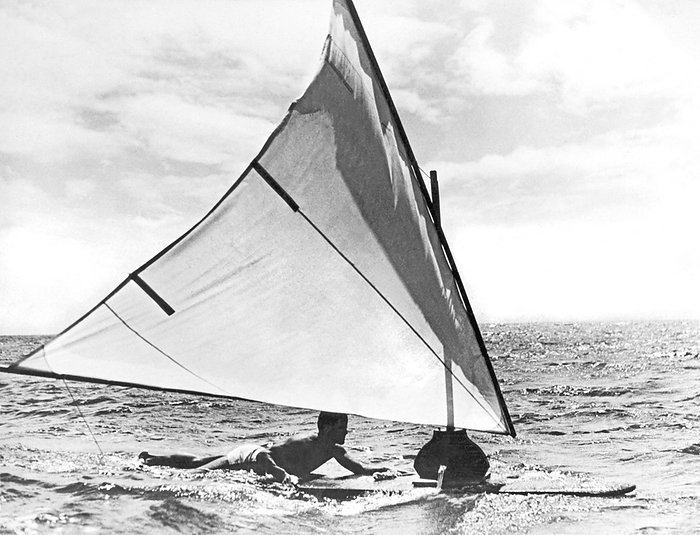 Hawaii,  March:  March 31, 1935
Surfing innovator Tom Blake rides a traditional surfboard that has been outfitted with a sail. This is the latest thing in Hawaii, and is sure to spread to other areas,