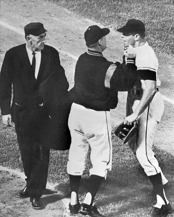 Baltimore, Maryland:  May, 1963
Baltimore first baseman JIm Gentile gets collared by his manager Billy Hitchcock as he charged towards umpire Ed Runge after being ejected from the game.