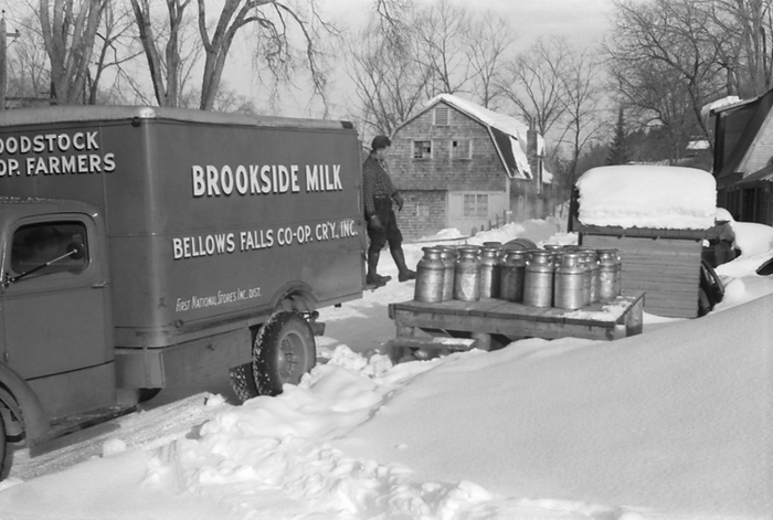 Woodstock, Vermont:  c. 1939
Farmers bring their cans of milk to the crossroads early every morning where it is picked up by the Bellows Falls Co-op Creamery truck and is taken to Brookside Milk company in town.