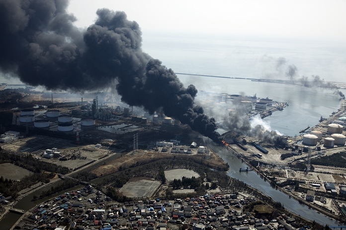 Great East Japan Earthquake Devastated by the Great Tsunami March 13, 2011, Sendai, Japan   Columns of thick black smoke reach high in the air from a burning oil refinery in Sendai, Miyagi prefecture, on Sunday, March 13, 2011, two days after a powerful earthquake with a magnitude 9.0 jolted Japan s northeastern prefectures, wreaking havoc on otherwise The death toll from the nation s worst and the world s fourth worst quake could rise above 10,000.  Photo by Tohan Koku Service AFLO   0994   mis 