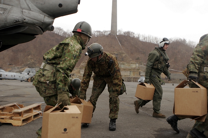 Great East Japan Earthquake Operation Friends Japanese Self Defense Force members and a Marine with Marine Medium Helicopter Squadron 262  Reinforced , 31st Marine Expeditionary Unit, unload water delivered as part of a humanitarian aid and disaster relief operation, March 21. Navy and Marine Corps involvement in the relief mission is part of a larger U.S. government response, coordinated through the U.S. Department of State, aiding the government of Japan in their ongoing relief efforts. As part of Operation Tomodachi, the 31st MEU is ready to support our long time Japanese partners and to provide assistance when called upon.  Photo by USMC AFLO   0006 
