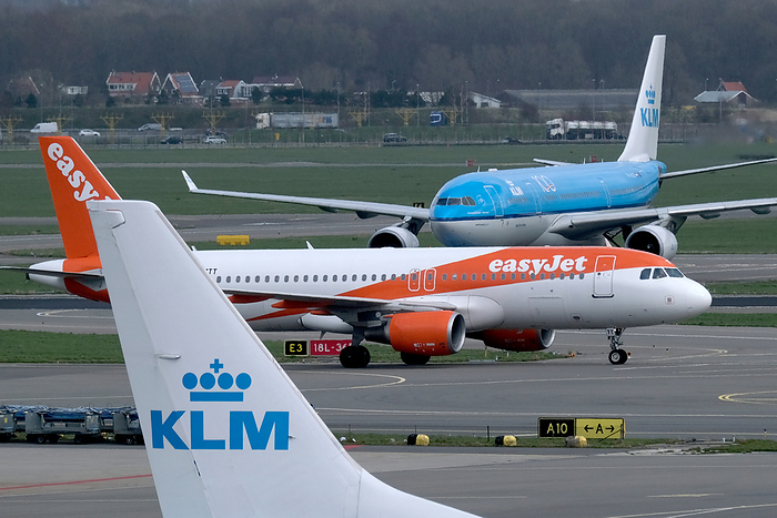 Amsterdam Airport Schiphol An aircraft operated by British low cost airline Easyjet drives between airplanes operated by KLM Royal Dutch Airlines in Amsterdam Airport Schiphol on March 9, 2020 in Schiphol, Netherlands.   Photo by Yuriko Nakao AFLO   