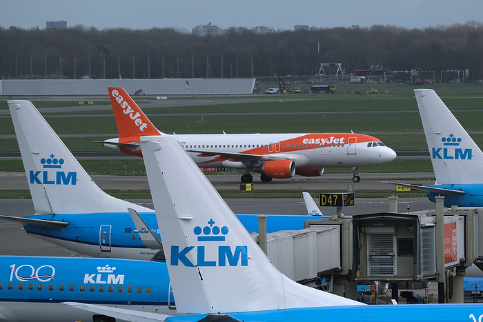 Airport Schiphol An aircraft operated by British low cost airline Easyjet drives between airplanes operated by KLM Royal Dutch Airlines in Amsterdam Airport Schiphol on March 9, 2020 in Schiphol, Netherlands.   Photo by Yuriko Nakao AFLO   