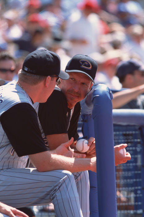 Randy Johnshon, Curt Schilling (Diamondbacks), 
2002 - MLB : Arizona Diamondbacks pitcher Randy Johnson #51 (R) talks with Curt Schilling #38 in the dugout during the game. 
(Photo by AFLO) [0672]