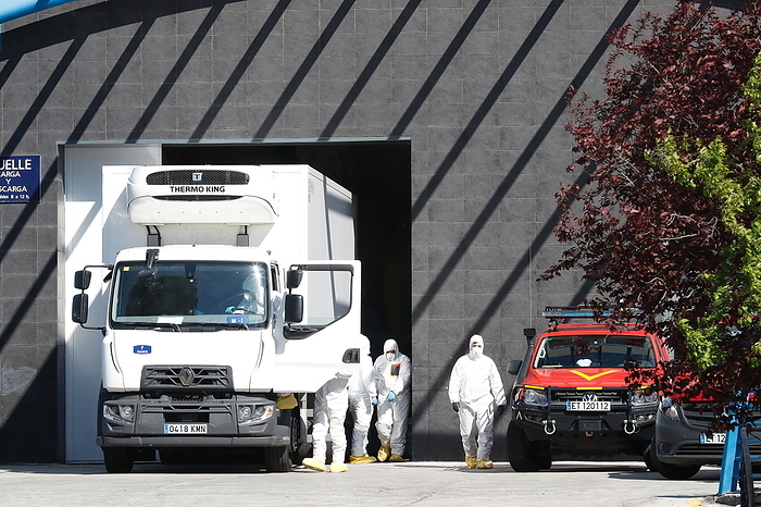 Virus Outbreak Spain Military emergency unit staff working outside the temporary morgue Palacio de Hielo due to the emergency declaration due to the Corona Virus  COVID 19  outbreak in Madrid, Spain, MARCH 26, 2020.  Photo by Mutsu Kawamori AFLO 
