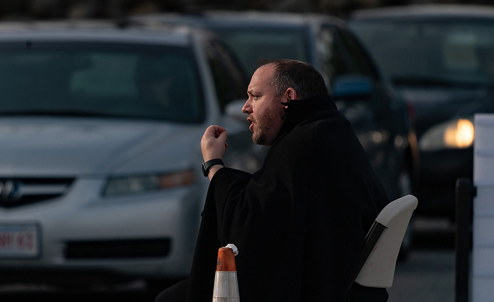 drive up confessions during Covid 19 April 1, 2020, Chelmsford, Massachusetts, USA: Father Corey Bassett Tirrell hears at drive up confessions in the parking lot of St. Mary  Catholic Church during Covid 19 pandemic in Chelmsford.