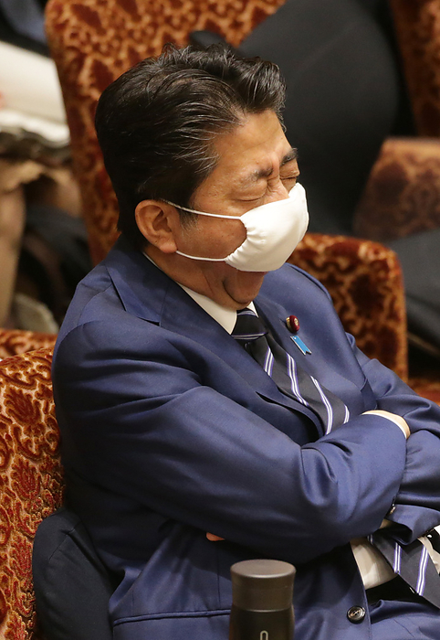 National Diet of Japan, House of Councillors, Committee on Accounts Prime Minister Shinzo Abe yawns through his mask at a meeting of the House of Councillors  Accounts Committee wearing a mask.