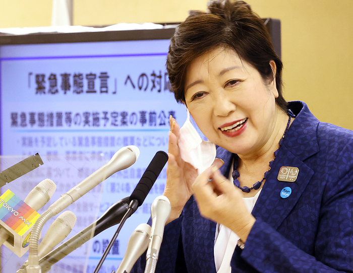 Tokyo Governor Yuriko Koike holds a regular press conference April 3, 2020, Tokyo, Japan   Tokyo Governor Yuriko Koike removes a face mask to drink water during a press conference at the Tokyo Metropolitan Government in Tokyo on Friday, April 3, 2020. Koike asked people to stay home over the weekend.    Photo by Yoshio Tsunoda AFLO 